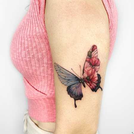 Transforming art with a butterfly and flower tattoo, each detail tells its own story