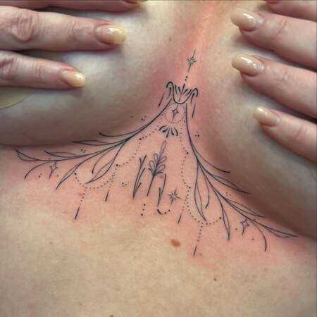 Explore underboob tattoo design ideas and other boob tattoos