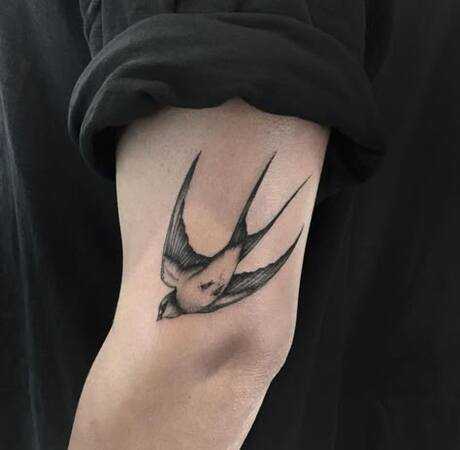 Timeless Sparrow Tattoos to Represent Adventure and Hope