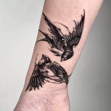 Stunning Swallow Tattoo Designs that Symbolize Meaning and Freedom